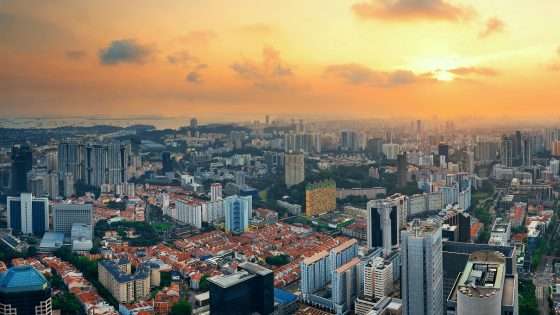 singapore rooftop view with urban skyscrapers sunset